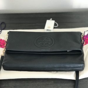 Tory Burch leather folded cross body.
